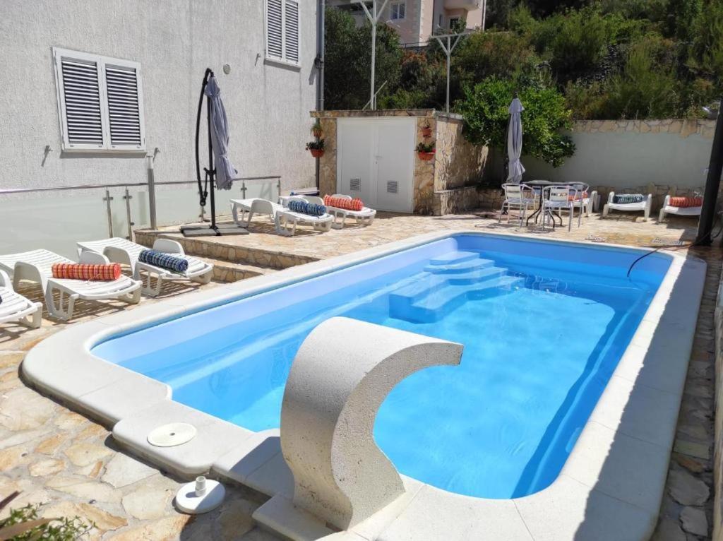 Apartments Sollis Traù Esterno foto